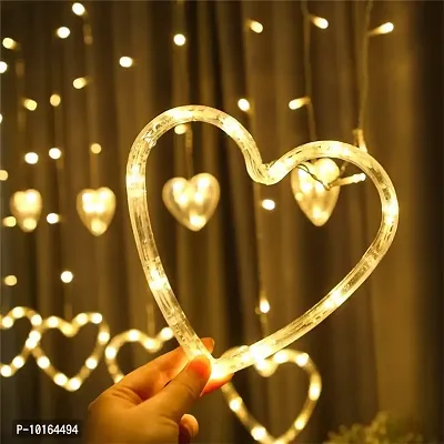 Ashtavinayak Store 12 Heart 114 LED Curtain String Lights, Window Curtain Decoration Lights with 8 Flashing Modes Remote (2.5 Meter, Warm White,Corded Electric,Plastic,Corner)-thumb3