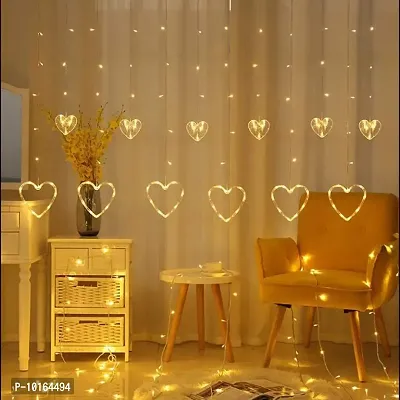 Ashtavinayak Store 12 Heart 114 LED Curtain String Lights, Window Curtain Decoration Lights with 8 Flashing Modes Remote (2.5 Meter, Warm White,Corded Electric,Plastic,Corner)-thumb0