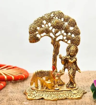 Metal Lord Metal Cow Calf and Krishna Idol Showpiece Under Tree Sculpture for Home D&eacute;cor Home Diwali Puja Home decoration Festival Gifts Decorative Showpiece - 16 cm&nbsp;&nbsp;(Brass, Gold):Krishna Tree 217