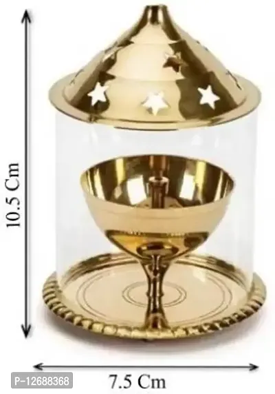 D&eacute;cor offers you Akhand Diya made by brass. It is Ideal for creating calm and meditative atmosphere in your puja room. Heaven D&eacute;cor Akhand Diya (Height: 4 inch)_Glass Diya 230-thumb2