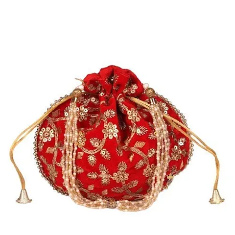 Amazing good quality pearl handle partywear potli bag