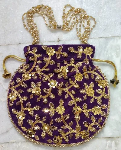 Amazing good quality pearl handle partywear potli bag