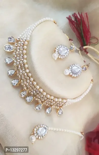 Exotic Off-White Gold Plated Kundan Studded Jewellery Set