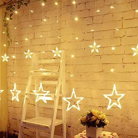 AFTERSTITCH Star Lights for Decoration Hanging 12 Stars on Curtain String LED Lights for Balcony Window Birthday , Diwali, Christmas, New Year and Home Decoration with 8 Modes Flashing (Warm Color)