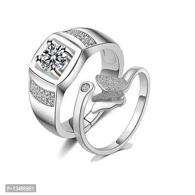Beautiful pair of white gold wedding rings with gems, isolated. The photo  was taken by stacking Stock Photo - Alamy