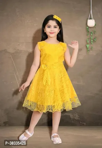 Fabulous Cotton Blend Yellow Embellished Frock For Girl