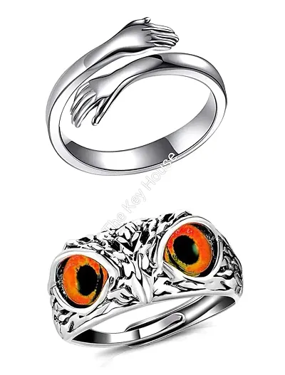 The Key House Valentine?s Stylish Hot Combo of Silver Hug Ring and Lucky Owl Eye Ring (Orange Eye) Latest Trendy Stainless Steel Couple Rings for Unisex Stainless Steel. (COMBO Pack of 2)