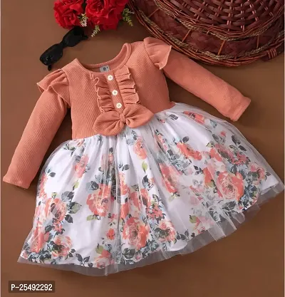 Fabulous Peach Polyester Printed Fit And Flare Dress For Girls