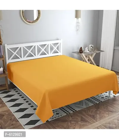 Comfortable Yellow Cotton Blend Solid Double Bedsheet Only