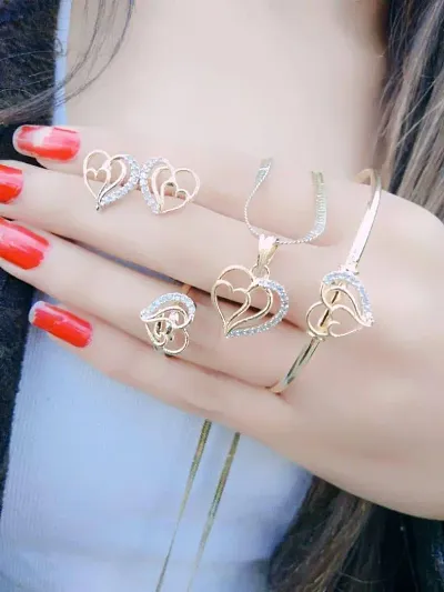 Trendy Alloy Golden Pendant Set With Earring, Ring And Bracelet Combo For Women