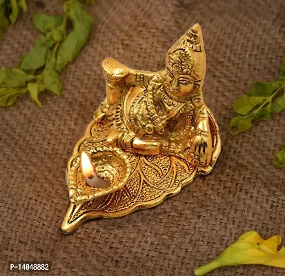 Brass Kuber on Leaf with Diya