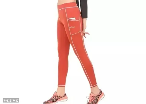 Stylish Orange Lycra Solid Jeggings For Women