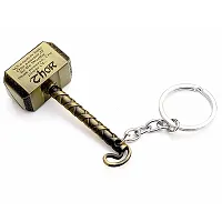 JSR ENTERPRISES PRESENTS MULTICOLORED BUY ONE GET ONE FREE THOR HAMMER KEYCHAIN AND KEYRING | THOR HAMMER | THOR KEYCHAIN | SHIVA TRIDENT KEYCHAIN FREE FOR CAR AND BIKE (THOR HAMMER KEYCHAIN GOLD)-thumb1