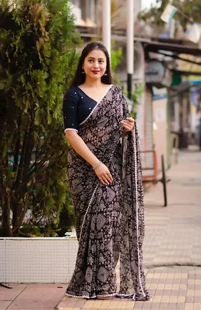 WOMANS GEORGETTE SAREE WITH BLOUSE PIECE