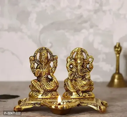 Golden Metal Handcrafted Decorative Goddess Lakshmi and Lord Ganesha Idols with Diya-thumb0