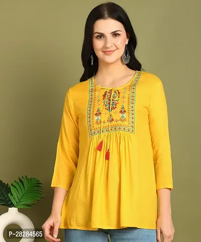 Stylish Yellow Rayon Embroidered Flare Style Short Kurti for Women