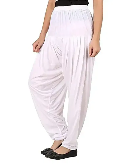 Fabulous White Viscose Rayon Solid Salwars For Women