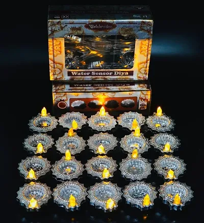 Madho Enterprices Led Water Sensor Diya Lights Electric Flameless  Smokeless LED Diyas, E-Diya for Diwali Decoration, Warm Orange Ambient Lights, Battery Operated Led Candles (Silver, Pack of 24)