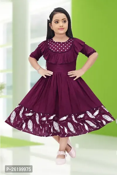 Fashionable and uniquely designed Polka and Feather Printed Purple Color frock for girls.