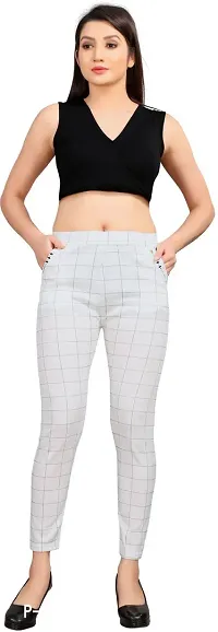 Stylish White Cotton Lycra Solid Jeggings For Women