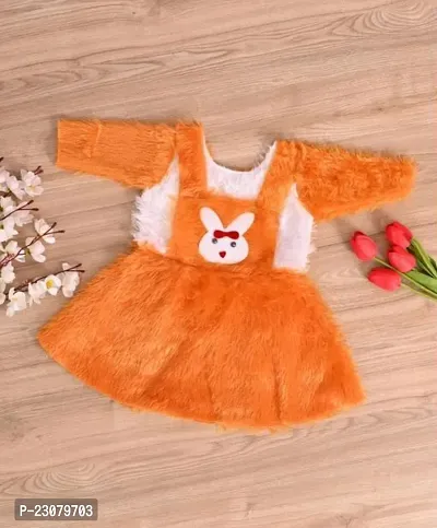 Elegant Orange Cotton Self Pattern Frocks For Girls