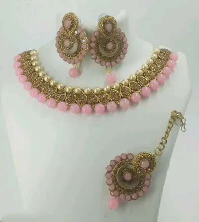 Shimmering Alloy Pearl Chic Necklace And Earrings With MaangTikka Set