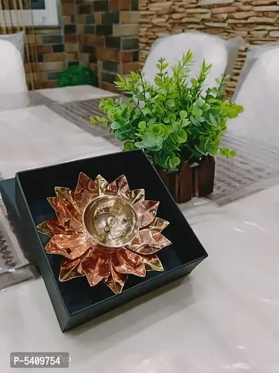 Brass and Copper Lotus Diya Golden color Kamalpatta Diya with Beautiful Black Fancy Gift Box
5 inch-thumb0