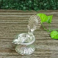 GODS CHOICE German Silver Beautiful Peacock With Feather Designing Diya For Pooja / Decor Size : 4 Inches Weight : 50 Grams-thumb1