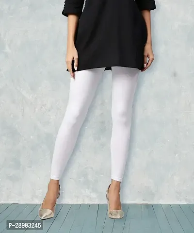 Stylish White Cotton Blend Solid Jeggings For Women