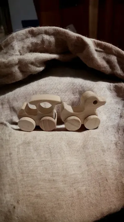 Pack of 2 Beautiful Neem Wooden Wheel Toys    Train    Duck Shapes