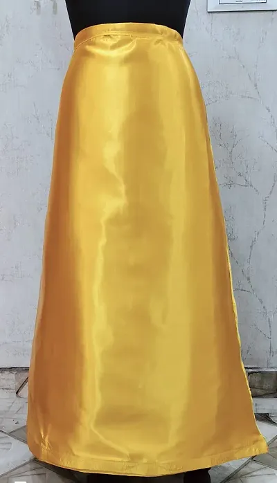 Reliable Yellow Satin Solid Stitched Patticoats For Women