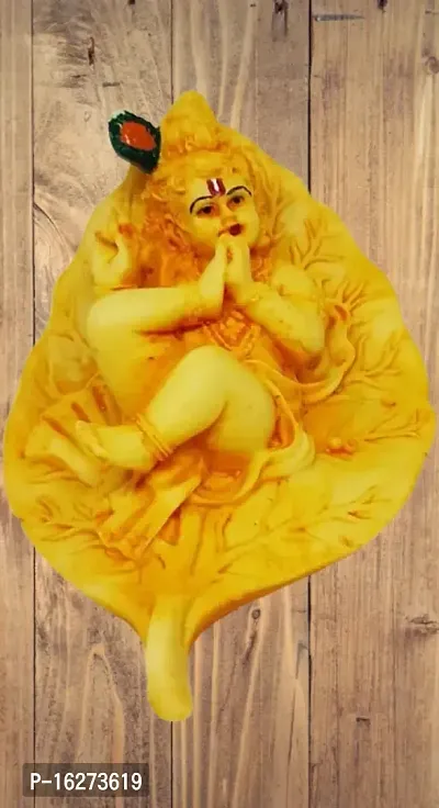 Little Krishna Statue in Leaf Laddu Gopal Murti for Home Temple Decorative Showpiece - (Polyresin, Yellow) Decorative Showpiece II Car Dashboard Decor II Goft Ideal