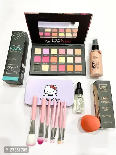 rose gold eyeshadow+fixer+pink kiti+serum+puff+pump primer+bottle foundation