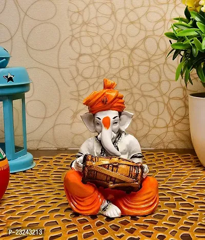 Coriox Ganesha Playing Dholak Polyresine Idol (16 cm x 13.59 cm x 13 cm)