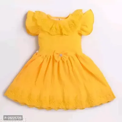Stylish Yellow Cotton Blend Solid Dress For Girls