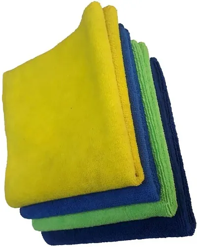 Premium Microfiber Cleaning Cloth Pack Of 4 - Gentle Yet Effective for All Surfaces - Streak-Free Shine - Reusable and Machine Washable - Eco-Friendly Solution.