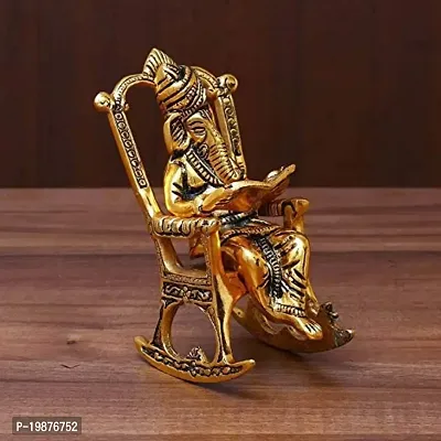 CRAFTAM Oxidised Golden Lord Ganesha Statue Sitting On A Chair and Reading Ramayan Figurine of Lord Ganesh for Home Decorative and Gifts (6 inch, Gold)