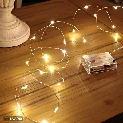 Atipriya 3AA Battery Powered Copper Wire 5 Meter 50 LED's Fairy String Lights for Home Decoration Festival Rice Ferry Light - Warm White(Pack of 1)