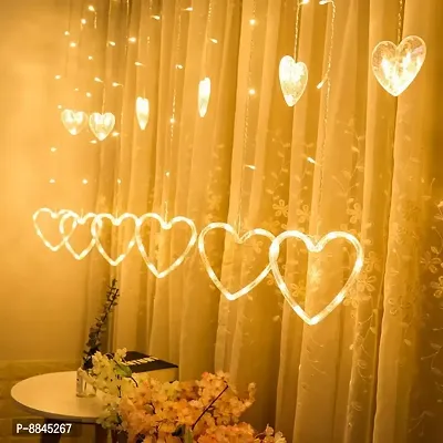 Warm White Heart/Diwali Curtain, String Lights with 12 Hanging Heart and 138 LED Light with 8 Flashing Modes, Decoration Lighting Pack of 1.-thumb0