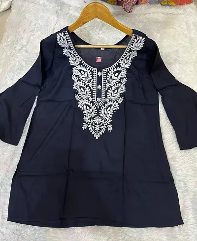 Computer embroidered Rayon short chikan kurti for women.