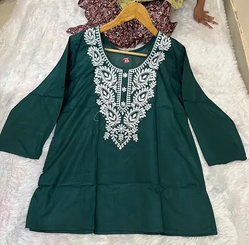 Computer embroidered Rayon short chikan kurti for women.