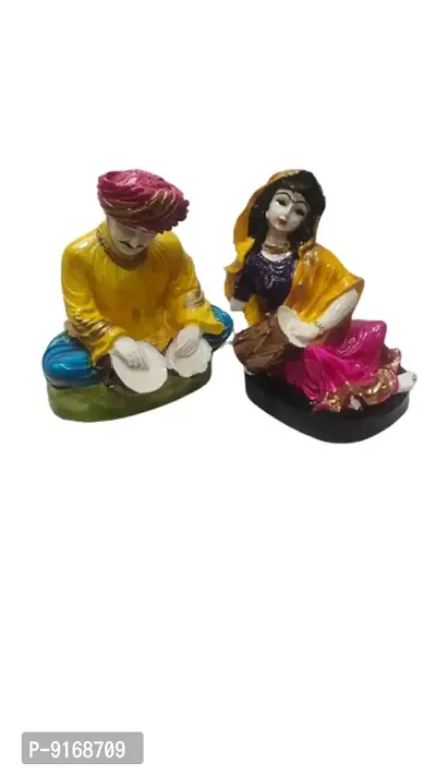 Handcrafted Traditions of Rajasthani Lady Playing Dholak marble Showpiece for Home Decor.