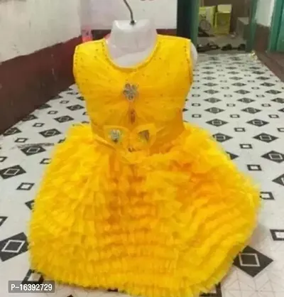 Fabulous Yellow Cotton Blend Printed Frocks For Girls