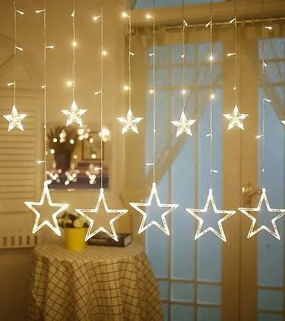 JIGAR 10 Stars Curtain String Lights, Window Curtain Lights with 8 Flashing Modes Decoration for Christmas, Wedding, Party, Home, Patio Lawn, Warm White