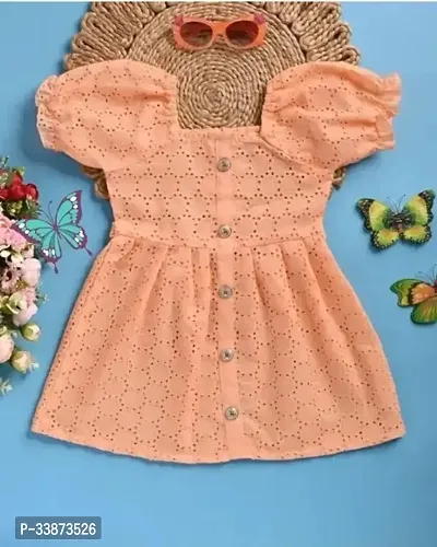 Fabulous Peach Cotton Blend Textured Frocks For Girls