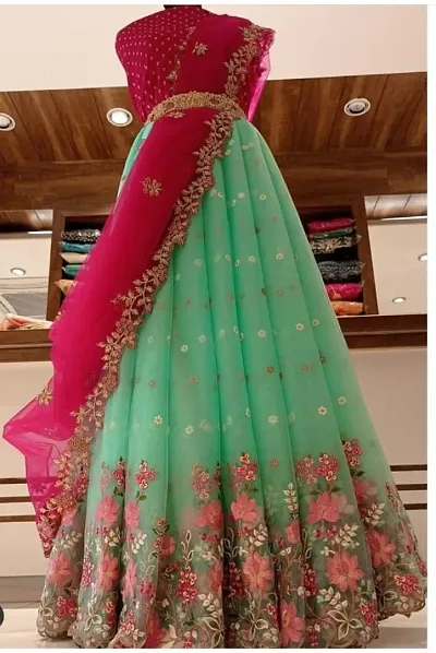 Attractive Net Embroidered Unstitched Lehenga Choli With Dupatta