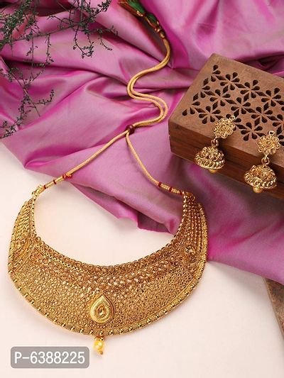 Traditional Handcrafted Hasli Style Gold Plated Stone Studded Choker with Earring and Maangtika-thumb0