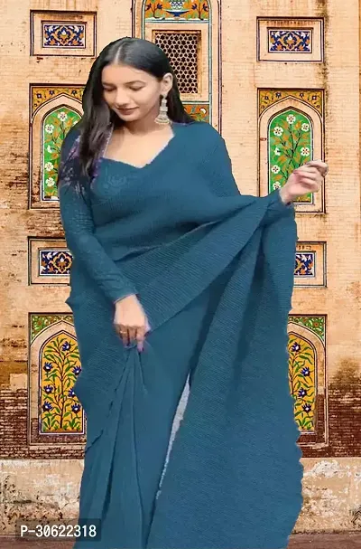 Stylish Georgette Teal Self Pattern Saree With Blouse Piece For Women