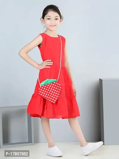 Red dress with strawberry print bag