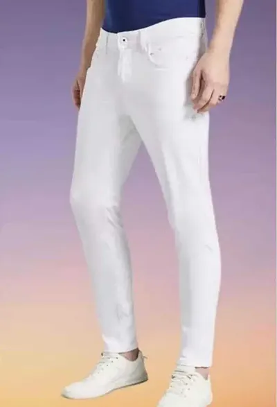 Men White Carrot Slim Fit Mid-Rise Slash Knee Stretchable Jeans